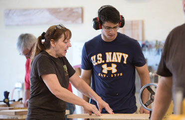 volunteer_1 learn to use a planer, always wear eyes and ears, basic woodworking classes