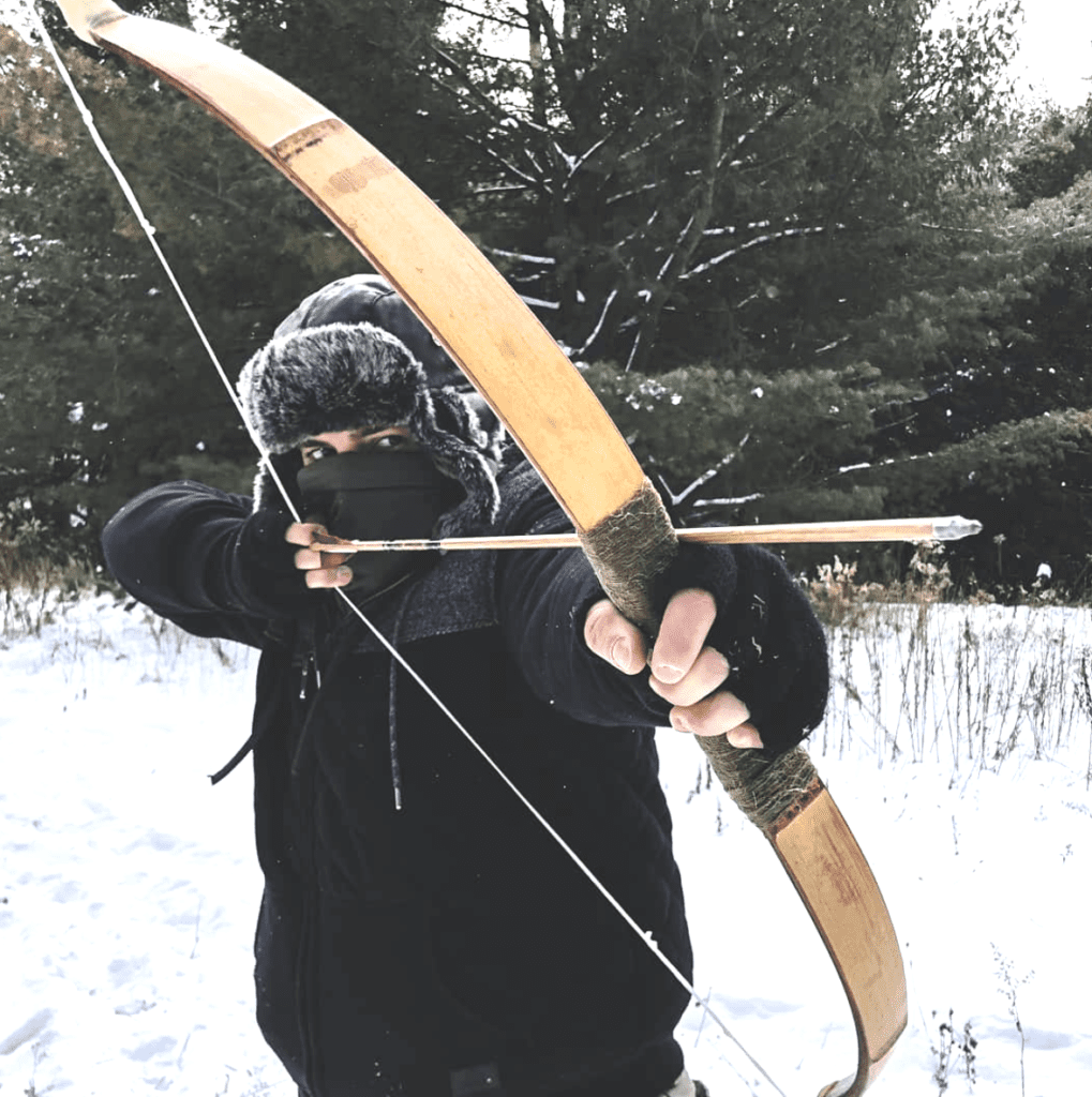 shooting bow and arrow